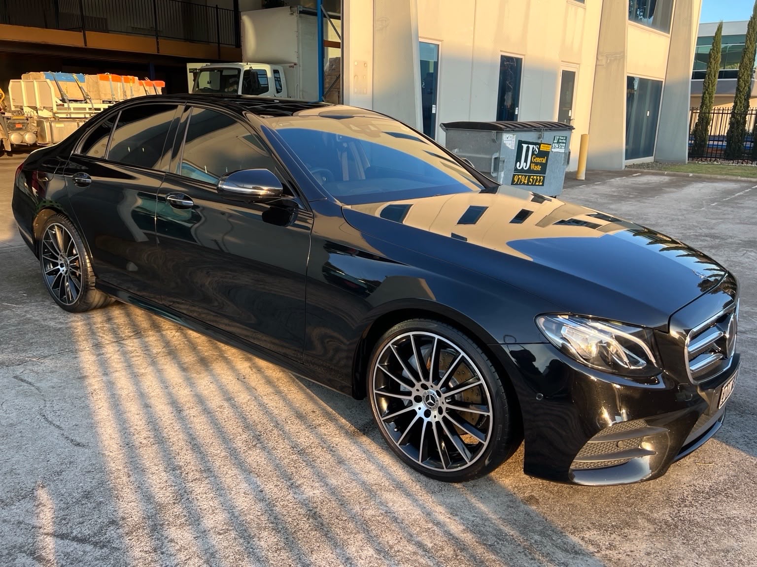 Vehicle after ceramic coating, cut and polish and paint correction with swirl-free glossy paint.
