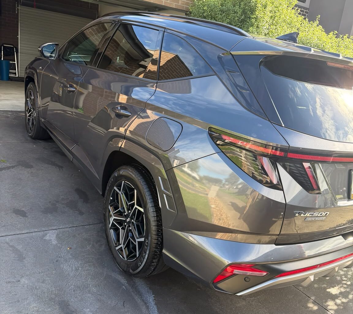 After paint correction, cut and polish and ceramic coating showing deep gloss and paint protection.

