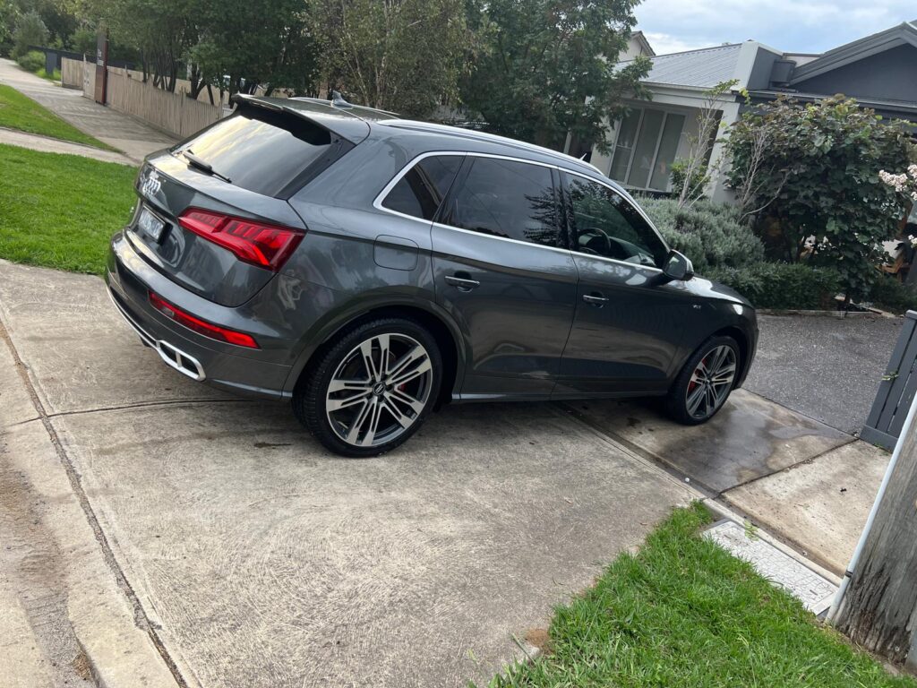 Luxury vehicle receiving premium detailing treatment