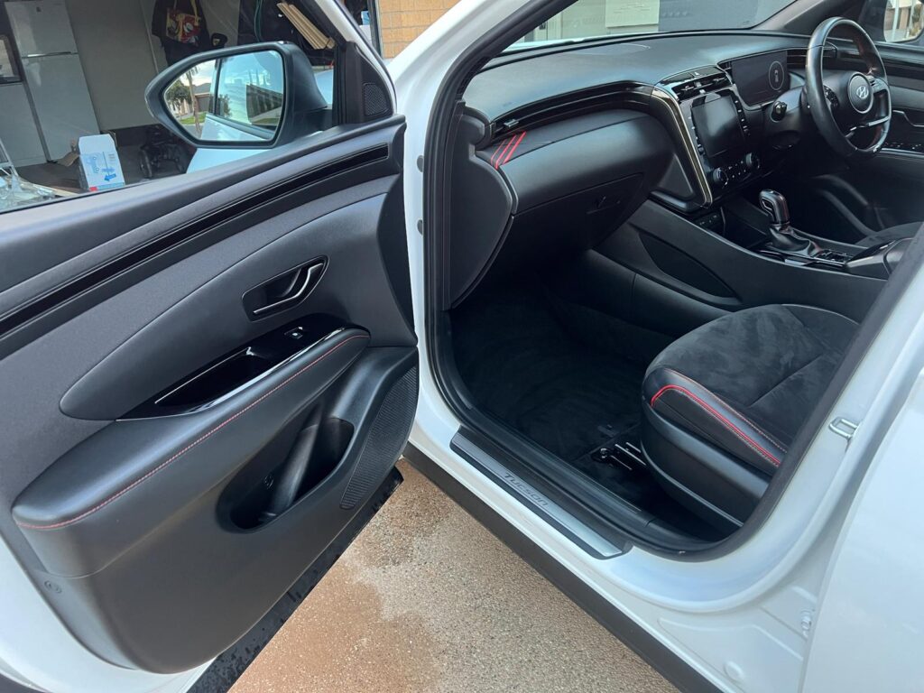 Car interior vacuuming and stain removal