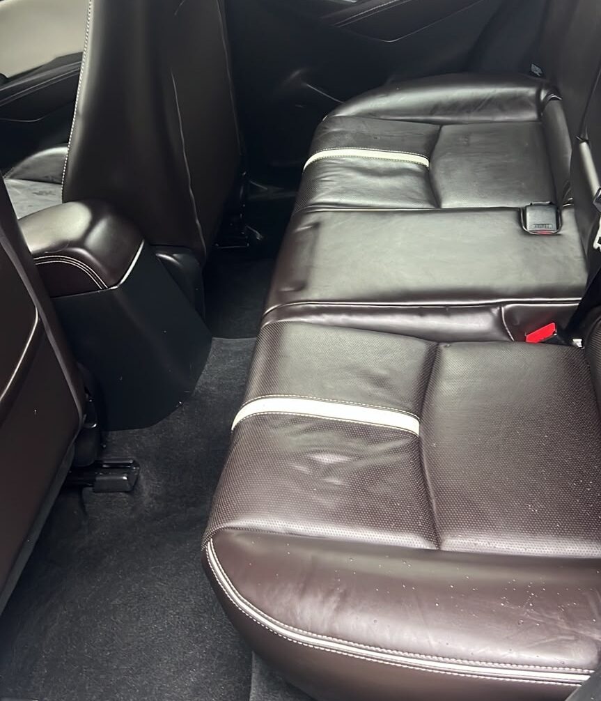 Rear passenger carpet restored after professional mould remediation and odour removal.
